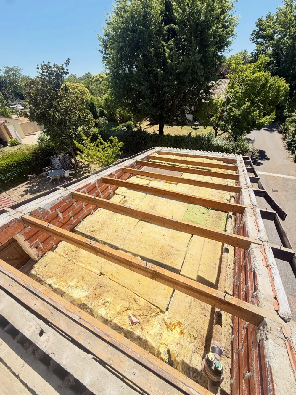 Rénovation de charpente bois et isolation thermique de toiture